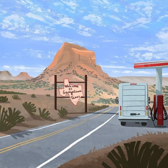 Moving truck at a gas station with a sign that reads 'Welcome to Georgetown Texas'